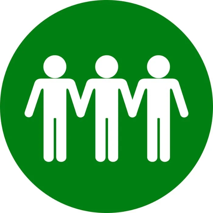 Icon representing community, teamwork, or group support Three simplified human figures holding hands inside a green circle