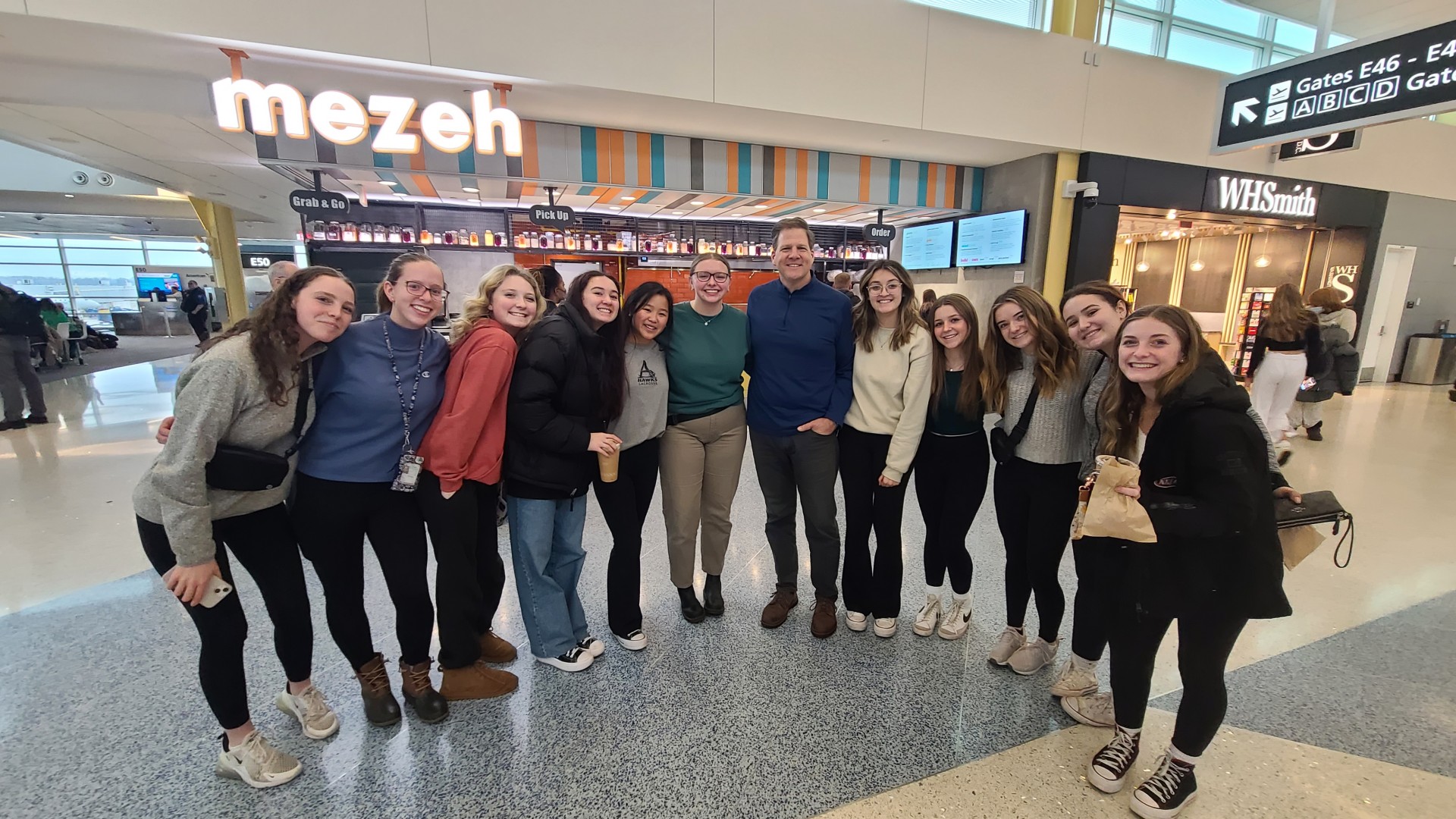 A group of students with Governor Chris Sununu. 