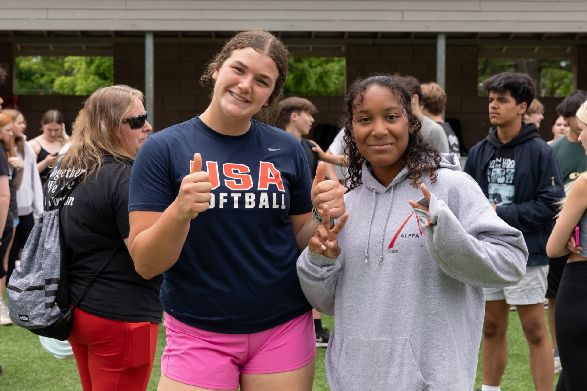 Two students smiling at camera